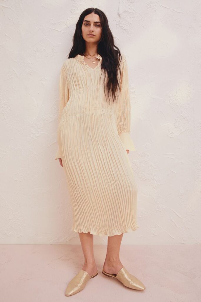 Chic Style Collective | H&M Spring Collection 2022 run, don’t walk. Pleated dress light beige