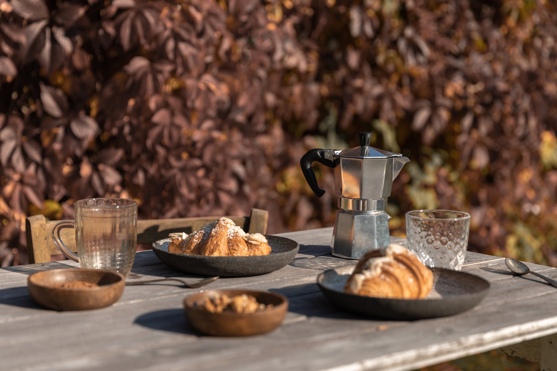 Chic Style Collective | 5 Secret Foodie Places to Visit in Paris. croissants on brown ceramic plates