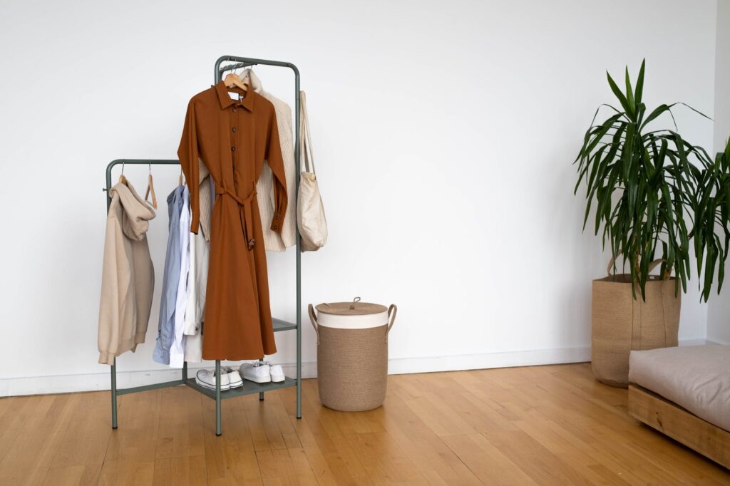 Organise a wardrobe
brown coat on clothes hanger